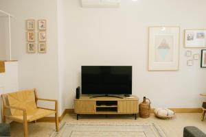 TV a/nebo společenská místnost v ubytování Casa da Porta Azul