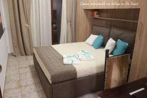 Postel nebo postele na pokoji v ubytování GUEST HOUSE ZIO MICHELE - CINISI