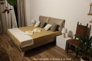 Postel nebo postele na pokoji v ubytování GUEST HOUSE ZIO MICHELE - CINISI