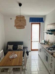 Una cocina o cocineta en Sorelle Casa Vacanza