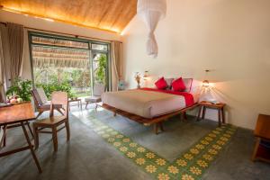 Postel nebo postele na pokoji v ubytování Mekong Home