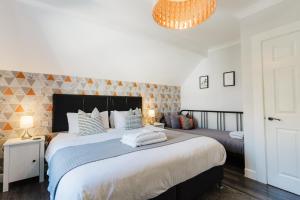 Sweet Suites Lytham客房内的一张或多张床位