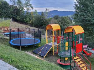 a playground with several different types at Domek u Jawora -Agroturystyka in Grywałd