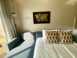 Posteľ alebo postele v izbe v ubytovaní Luxueux Appartement avec Vue Panoramique, Proche de la Gare WELCOME STAY