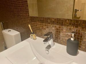 Kúpeľňa v ubytovaní Luxueux Appartement avec Vue Panoramique, Proche de la Gare WELCOME STAY