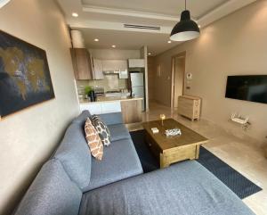 Televízia a/alebo spoločenská miestnosť v ubytovaní Luxueux Appartement avec Vue Panoramique, Proche de la Gare WELCOME STAY