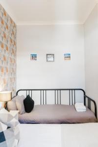 Sweet Suites Lytham客房内的一张或多张床位