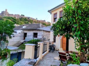a view of a house with a balcony at GEORGE's VILLA in Gjirokastër