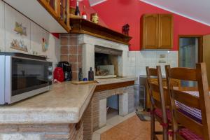 Kuchyň nebo kuchyňský kout v ubytování Apartment Red Romantic 2-1