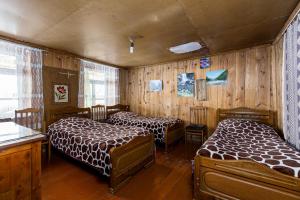 Postel nebo postele na pokoji v ubytování Guest House Nazo