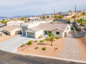 an overhead view of a house with palm trees at Heated Pool & Spa - Winterhavens Oasis in Lake Havasu City