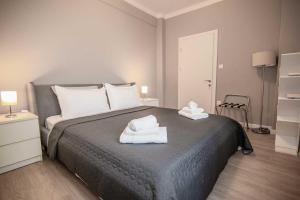 Posteľ alebo postele v izbe v ubytovaní Axd DownTown Spacious Lux Apartment