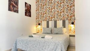 Postel nebo postele na pokoji v ubytování Corralejo Eri Pool Apartment with terrace