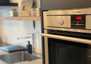 A kitchen or kitchenette at Tecnopolo Fiera Suite