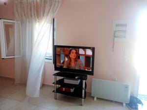 En TV eller et underholdningssystem på SARDINIA LUX HOUSE 697 4349 5 12