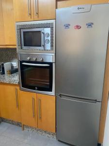 Kuchyňa alebo kuchynka v ubytovaní Apartamento con terraza sobre La Marina de Sotogrande