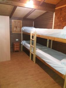Postel nebo postele na pokoji v ubytování Complejo Turístico & Camping Cabopino + 37 fotografií