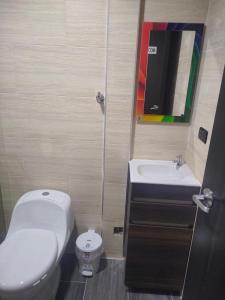 Koupelna v ubytování Hotel Cacique