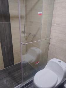 Koupelna v ubytování Hotel Cacique
