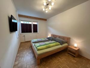 Postel nebo postele na pokoji v ubytování Appartement Heidi II (ohne Balkon/Terrasse)