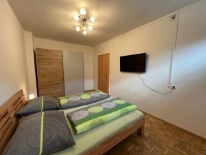 Postel nebo postele na pokoji v ubytování Appartement Heidi II (ohne Balkon/Terrasse)