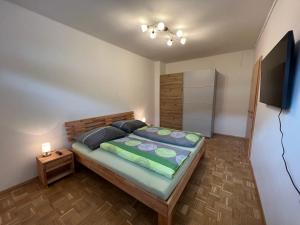 Postel nebo postele na pokoji v ubytování Appartement Heidi II (ohne Balkon/Terrasse)