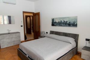Postel nebo postele na pokoji v ubytování A casa di Ivy e Baby