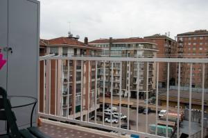 a view of a city from a balcony at A casa di Ivy e Baby in Turin