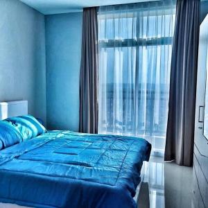 Кровать или кровати в номере SLEPTOPIA at Formosa - Lvl27 Budget Unit City and Seaview in Nagoya Jodoh