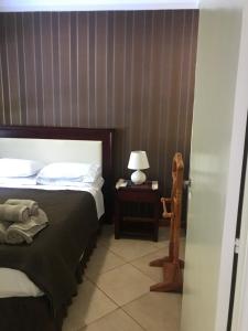Ein Bett oder Betten in einem Zimmer der Unterkunft Ocio Apart