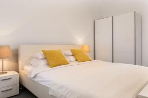 Postel nebo postele na pokoji v ubytování Zagreb City Apartments + 15 fotografií