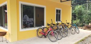 a row of bikes parked next to a building at The Spot @ Cocles in Puerto Viejo