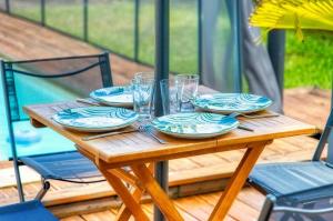 Swimmingpoolen hos eller tæt på Appartement Domi Caraïbes 2