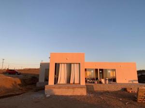a house in the middle of a desert at Casa de campo, con hermosa vista al mar in Tongoy