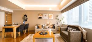 Posezení v ubytování Shanghai Centre Serviced Apartment