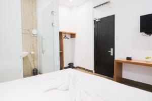 Voodi või voodid majutusasutuse King's Palace Medan RedPartner toas