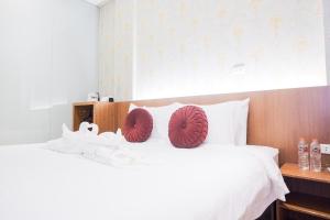 Voodi või voodid majutusasutuse King's Palace Medan RedPartner toas