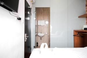 Voodi või voodid majutusasutuse King's Palace Medan RedPartner toas