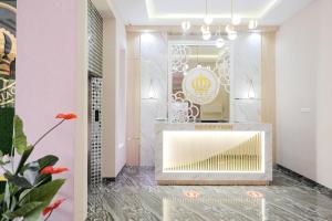 Foto sihtkohas Medan asuva majutusasutuse King's Palace Medan RedPartner galeriist