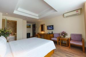 TV a/nebo společenská místnost v ubytování Roseland Corp Hotel