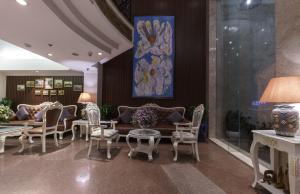 Posezení v ubytování Roseland Corp Hotel