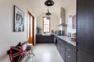a kitchen with a sink and a counter top at Rochville - Luxe, Dog Friendly Townhouse, Kyneton in Kyneton