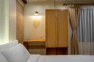 Karuna Hotel Patan Kathmandu客房内的一张或多张床位