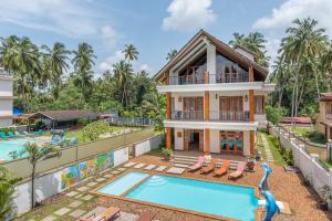 an image of a villa with a swimming pool at Villa Calangute Phase 11 in Calangute