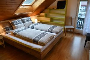Postel nebo postele na pokoji v ubytování Pension Chalet Charme