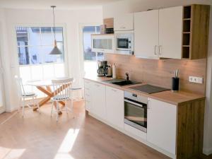 Nhà bếp/bếp nhỏ tại Reethaus Boddenblick - Apt. 09