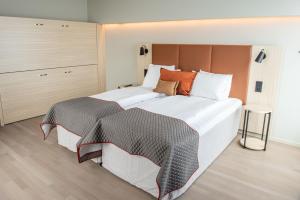 Postel nebo postele na pokoji v ubytování Quality Hotel Arlanda XPO