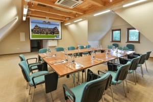 a conference room with a large table and chairs at Pensjonat pod Kotelnicą in Białka Tatrzanska +31 photos