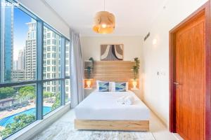 Postel nebo postele na pokoji v ubytování bnbmehomes - The Residences + 37 fotografií