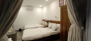 Postel nebo postele na pokoji v ubytování Hoang Phuc resort